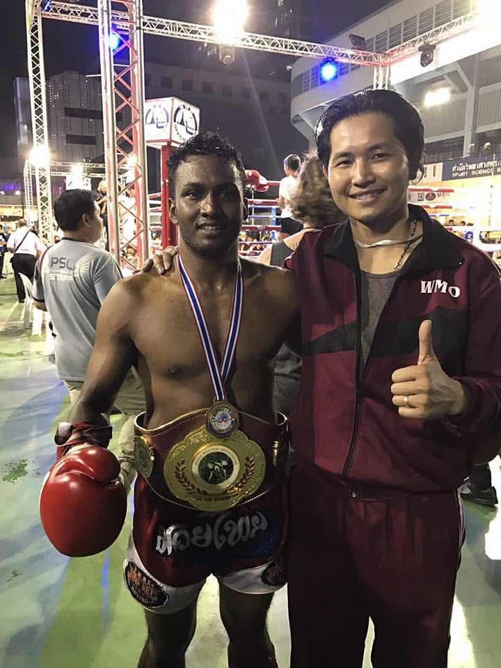 Nilanka Madushan with the WMO championship belt and official