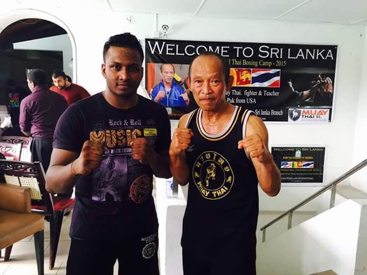 Nilanka Madushan with a Muay Thai master, 2015