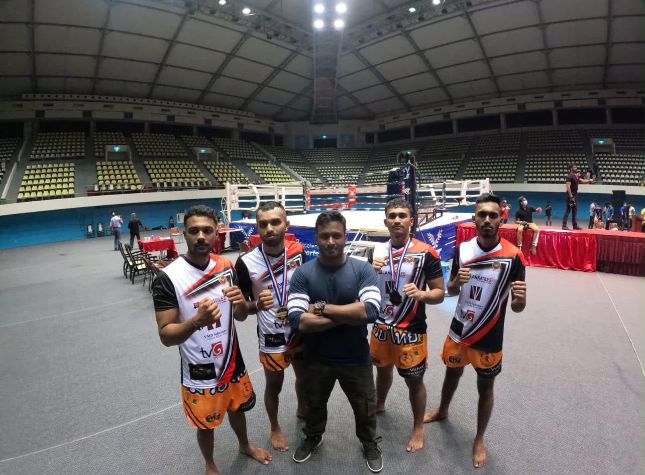 BPFA fighters with Coach Nilanka at a championship arena